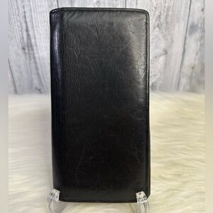 LOUIS VUITTON brazza taurillon monogram leather long wallet in black